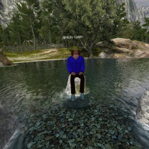 Avatar with a blue jacket sitting on a rock in a wilderness river